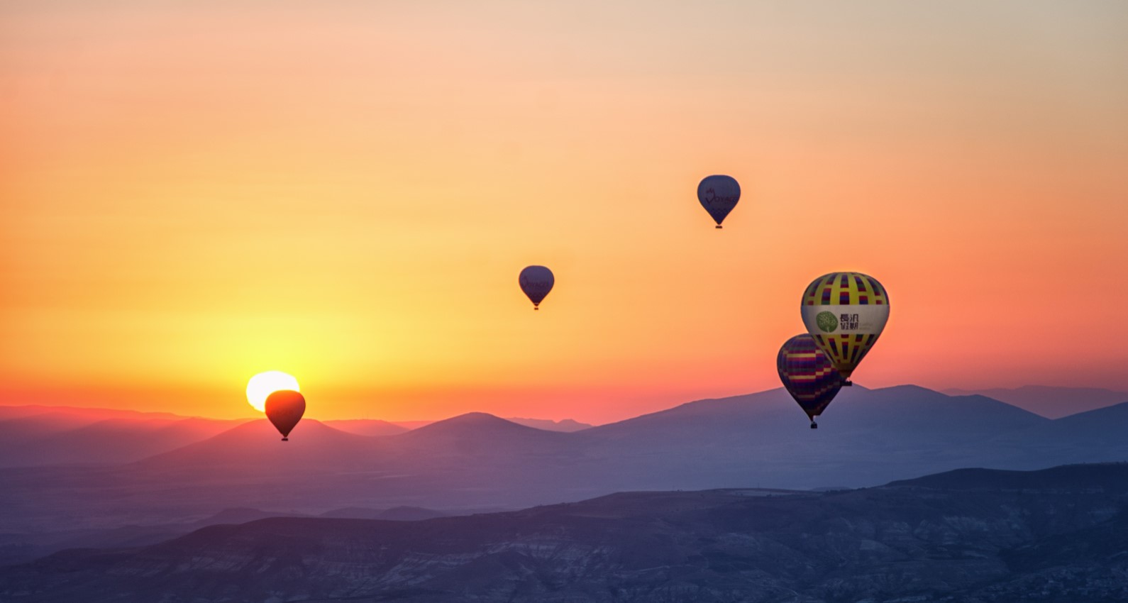 assorted-hot-air-balloons-photo-during-sunset-670061